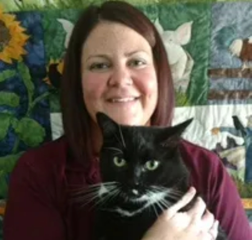 Krista smiling with cat